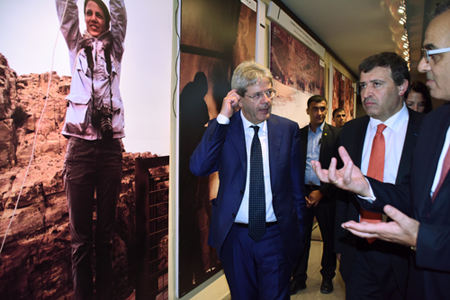 Labour Minister and acting tourism minister Nidal Katamine and Italian Foreign Minister Paolo Gentiloni tour the exhibition ‘The Net of the Siq: a Journey through the SIQ STABILITY project’ at the National Library Department on Tuesday (Photo courtesy of Agnes Montanari)